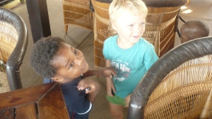 My daughter Thabo & son Limpho playing with their new found friend Thomas from Europe